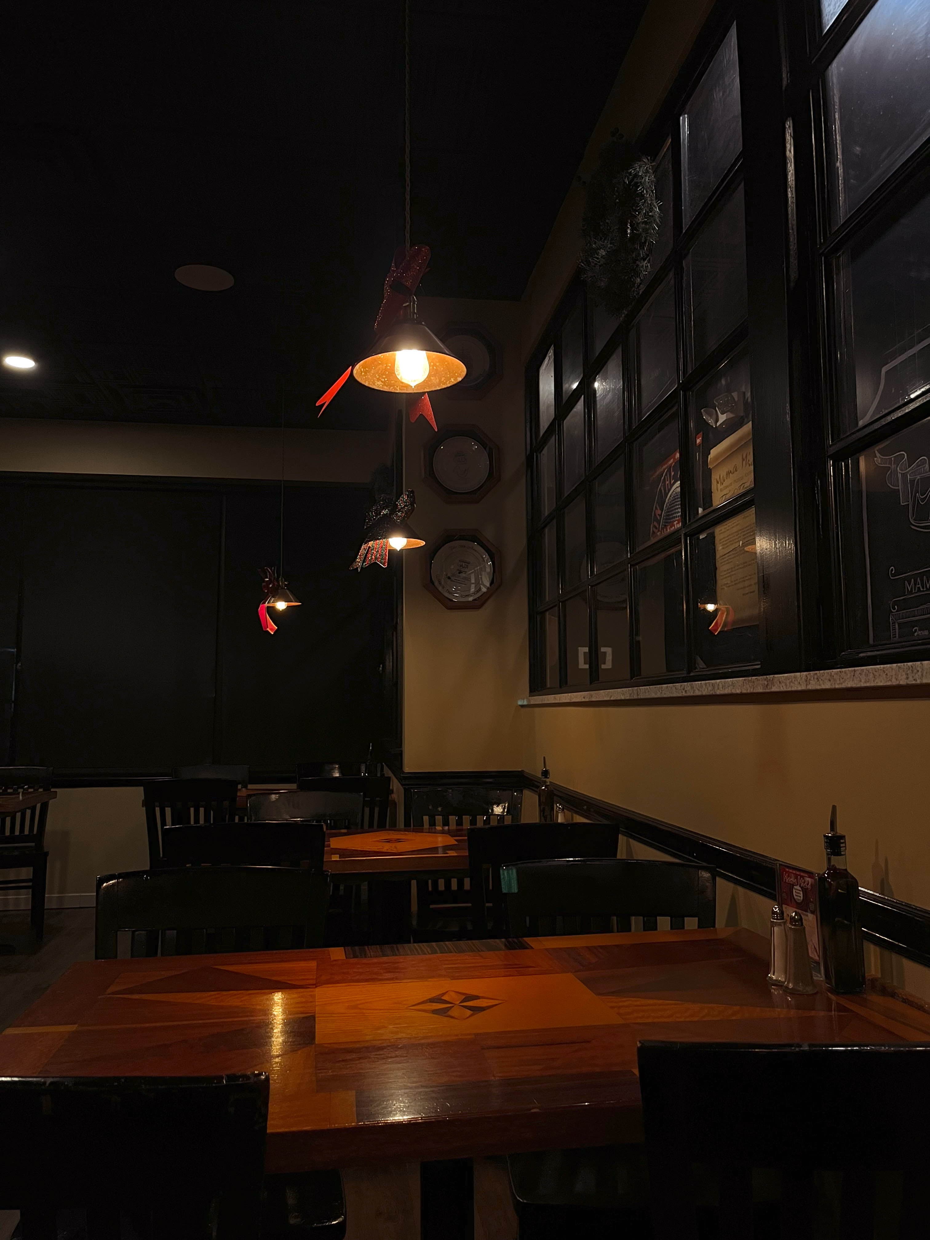 Elegant restaurant interior with warm lighting and Italian atmosphere