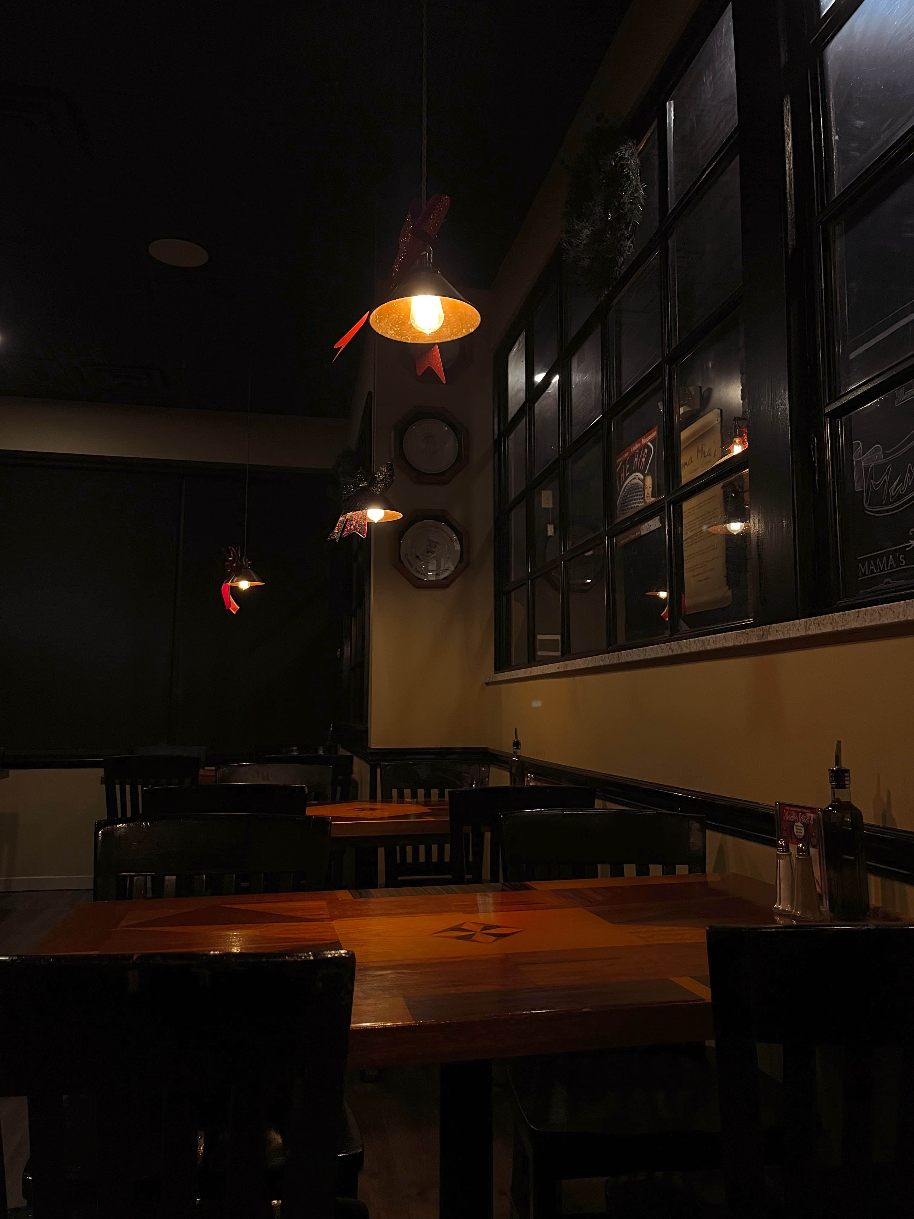 Intimate dining space with warm lighting and wooden furnishings