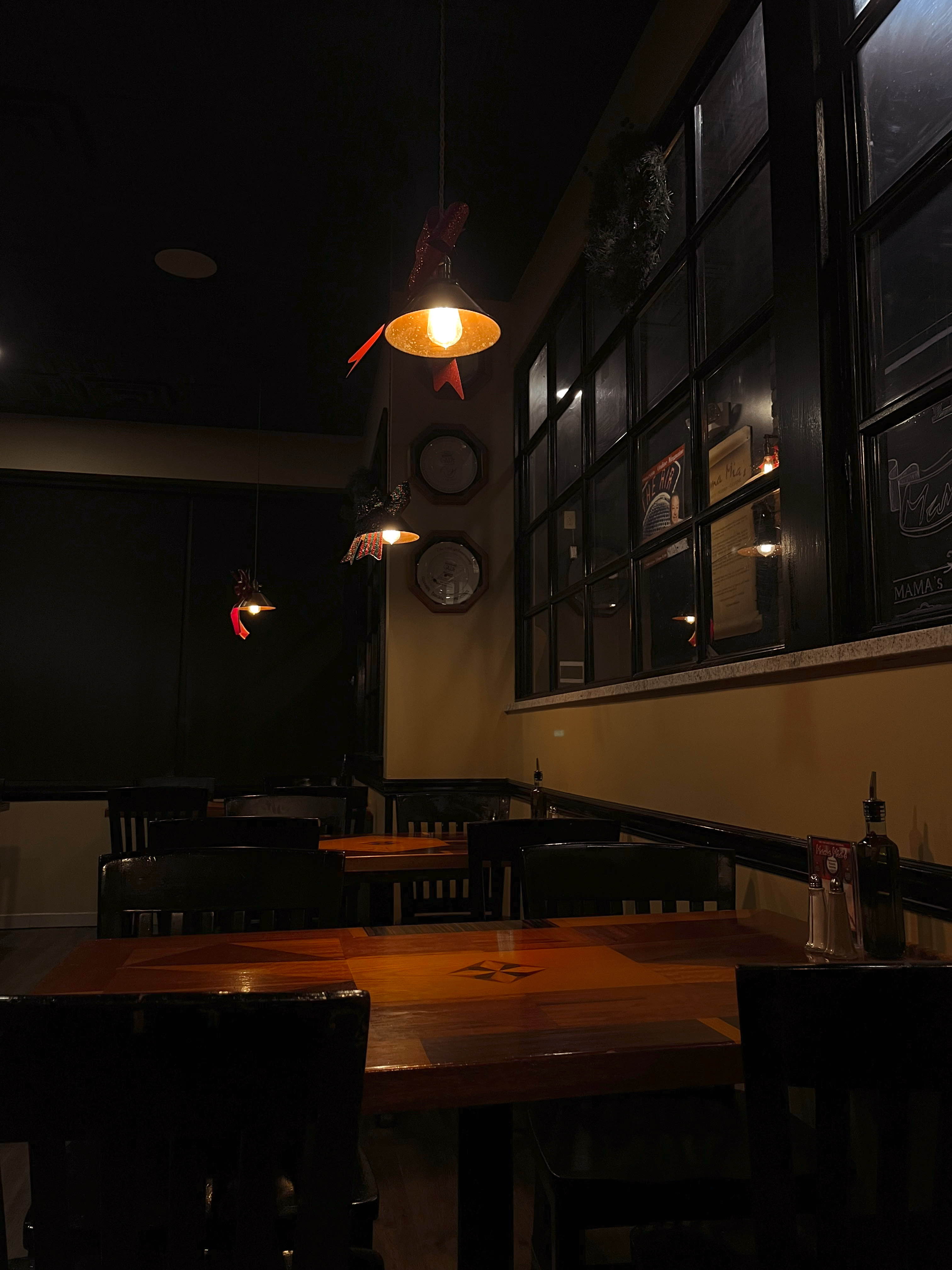 Intimate dining space with warm lighting and wooden furnishings